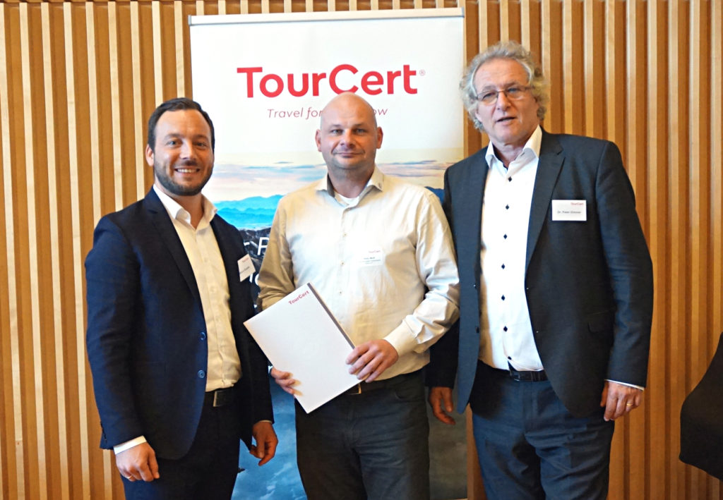 Marco Giraldo, Sven Wolf und Dr. Peter Zimmer